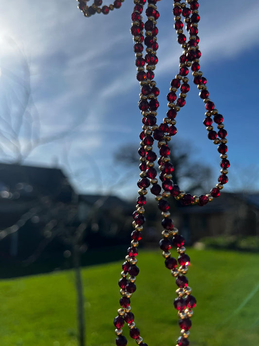 Tantric necklace with red garnet