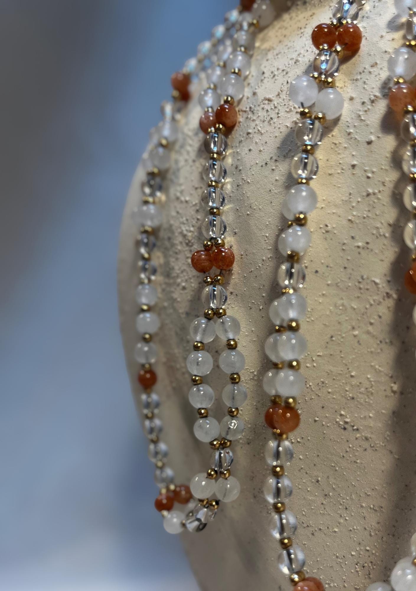 Tantric necklace with sunstone, clear quartz and white jade