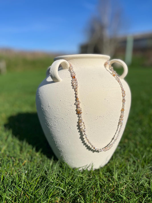 Handmade cherry agate tantric necklace inspired by kundalini traditions