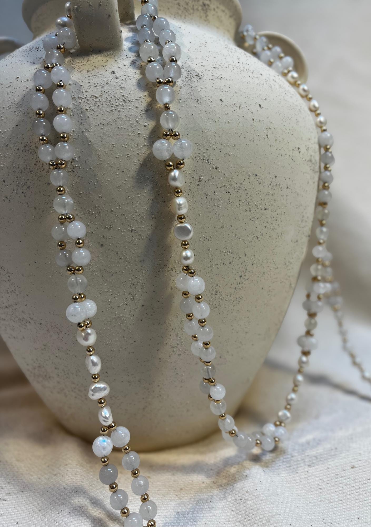 Handmade pearl, moonstone, jade and calcite tantric necklace inspired by kundalini traditions