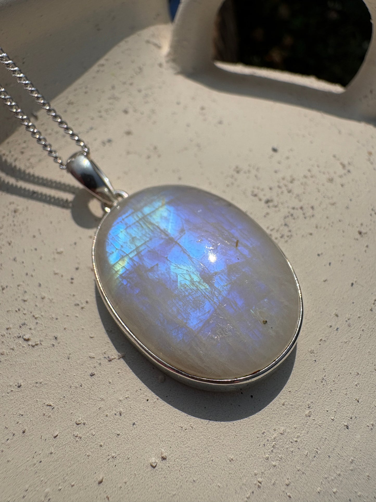 Rainbow moonstone silver pendant