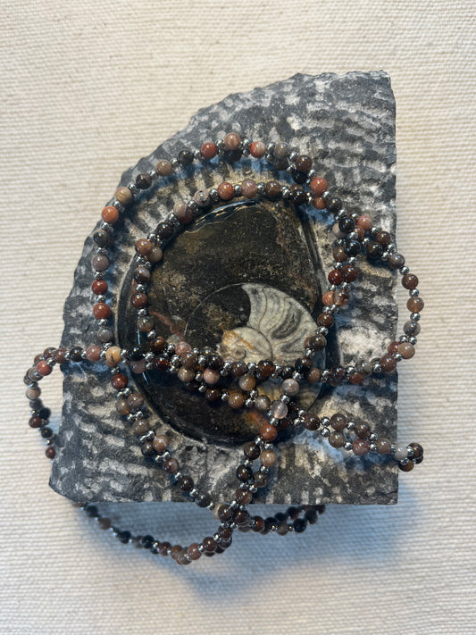 Tantric necklace with petrified wood and stainless steel