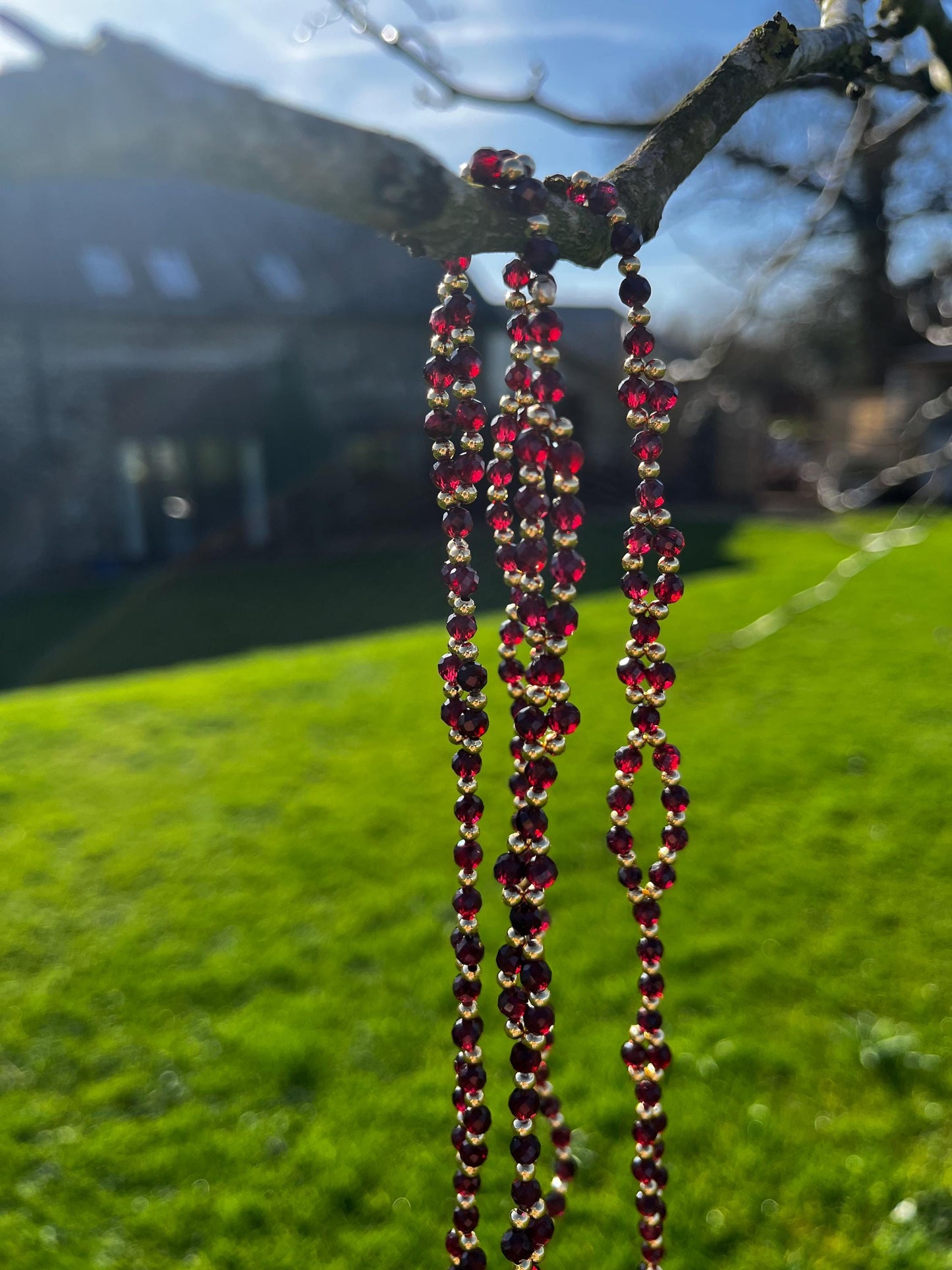 Tantric necklace with red garnet