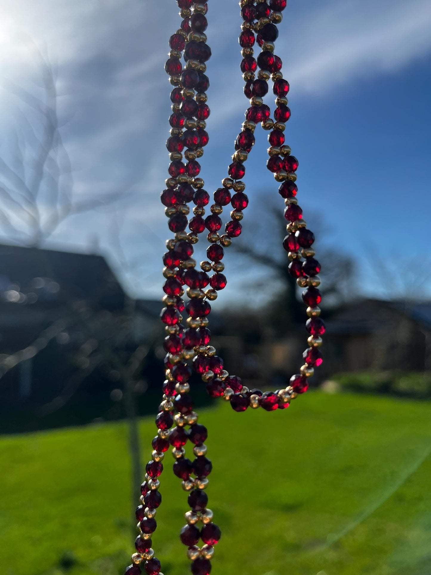 Tantric necklace with red garnet