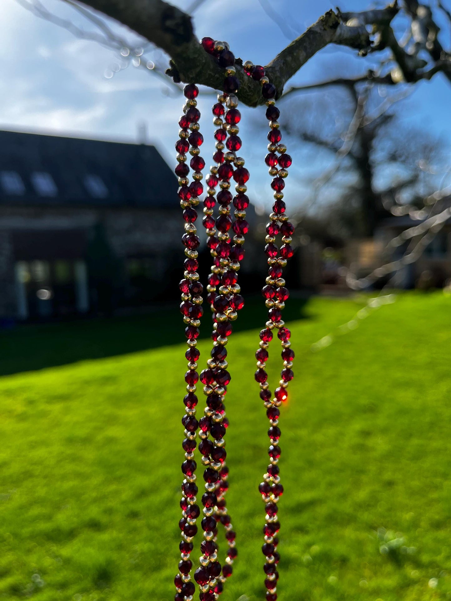 Tantric necklace with red garnet