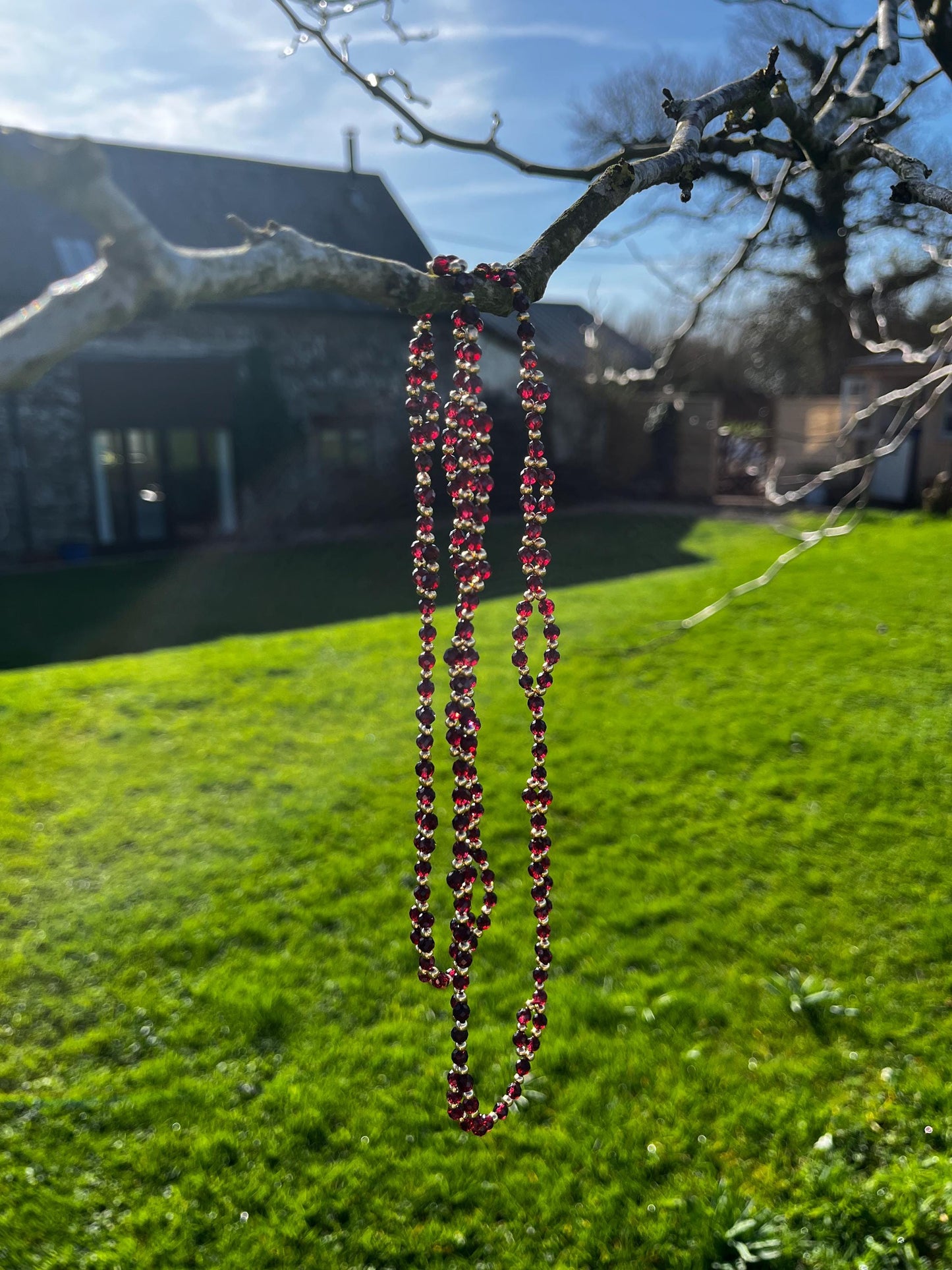 Tantric necklace with red garnet